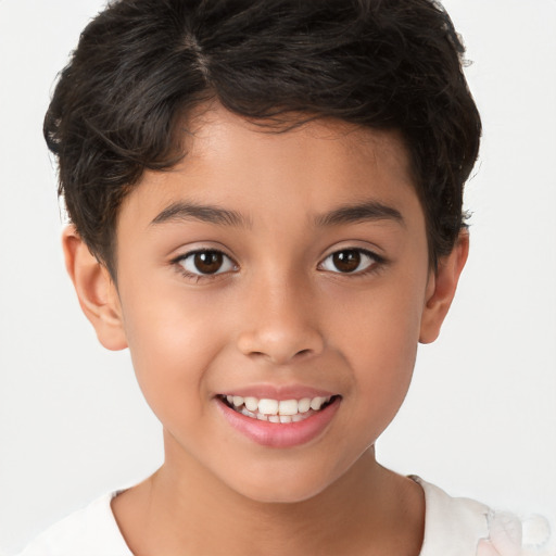 Joyful white child male with short  brown hair and brown eyes