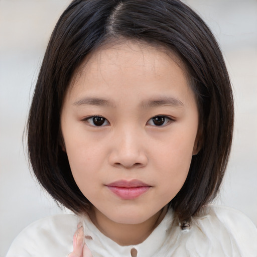 Neutral asian child female with medium  brown hair and brown eyes