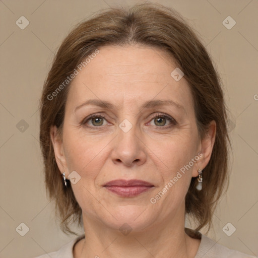 Joyful white adult female with medium  brown hair and grey eyes