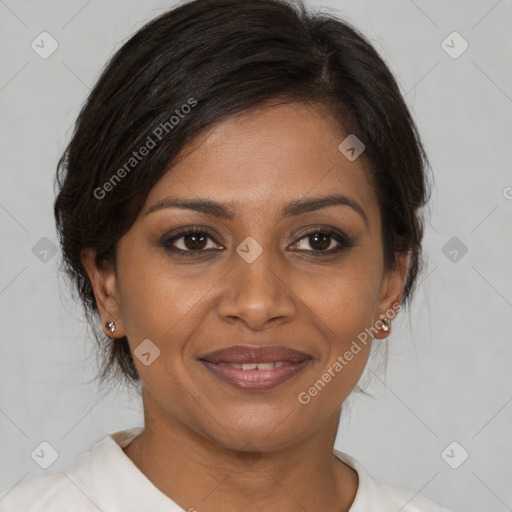 Joyful black young-adult female with medium  brown hair and brown eyes