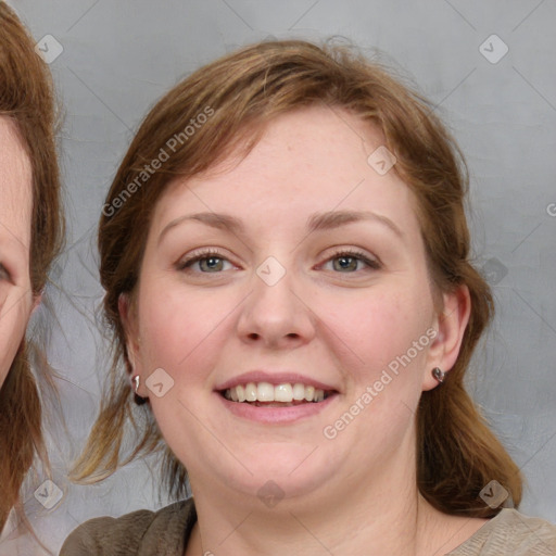 Joyful white young-adult female with medium  brown hair and blue eyes