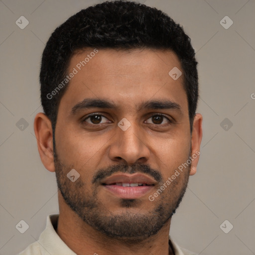 Joyful latino young-adult male with short  black hair and brown eyes