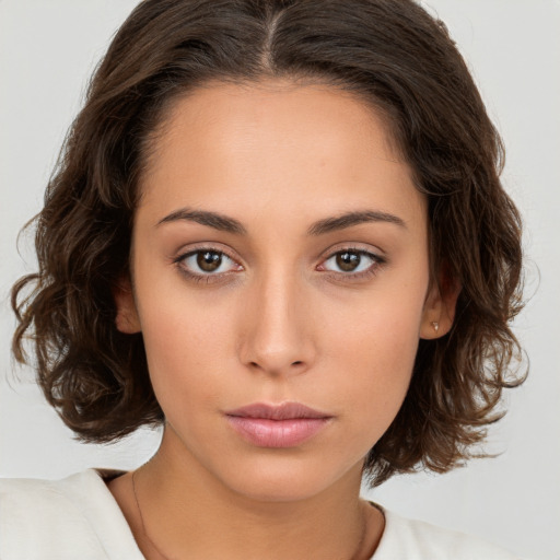 Neutral white young-adult female with medium  brown hair and brown eyes