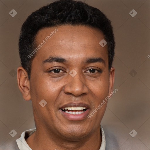 Joyful black adult male with short  brown hair and brown eyes