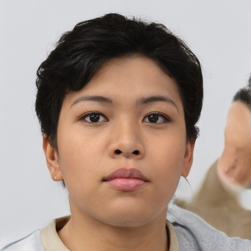 Neutral asian young-adult female with short  brown hair and brown eyes