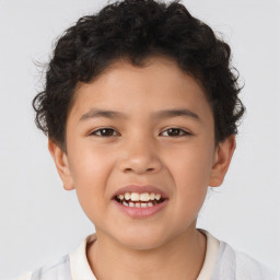 Joyful white child male with short  brown hair and brown eyes