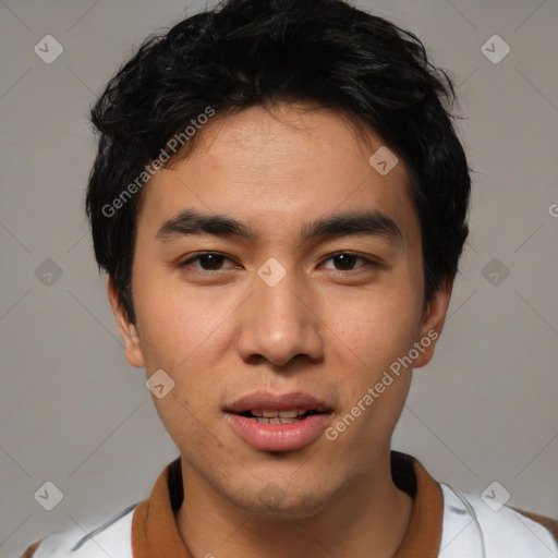 Joyful asian young-adult male with short  black hair and brown eyes