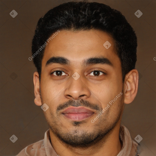 Joyful latino young-adult male with short  black hair and brown eyes