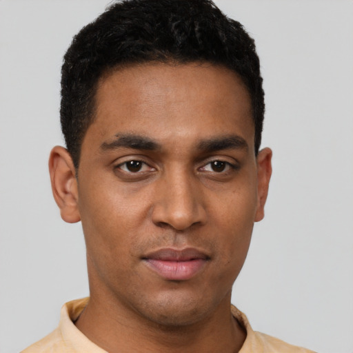 Neutral latino young-adult male with short  black hair and brown eyes