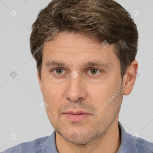 Neutral white adult male with short  brown hair and brown eyes