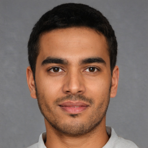 Neutral latino young-adult male with short  brown hair and brown eyes