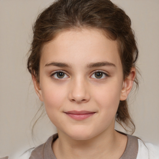 Joyful white child female with medium  brown hair and brown eyes