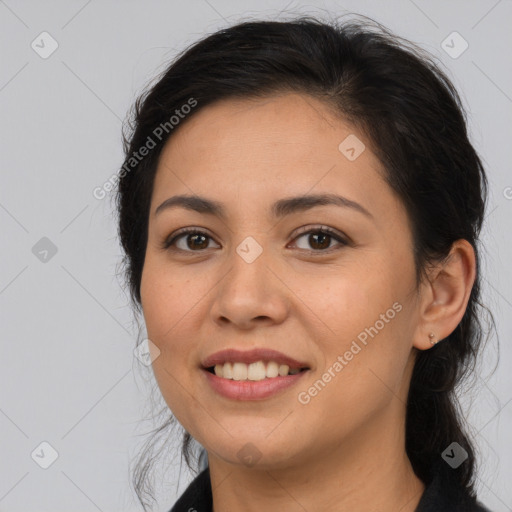 Joyful asian young-adult female with long  brown hair and brown eyes