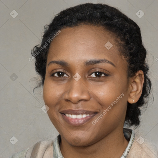 Joyful black young-adult female with medium  brown hair and brown eyes