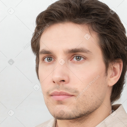 Neutral white young-adult male with short  brown hair and grey eyes