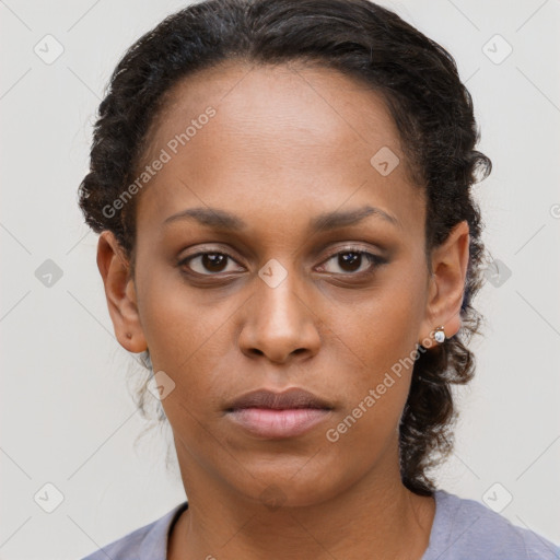 Neutral black young-adult female with short  brown hair and brown eyes