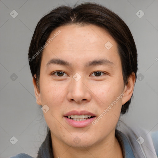 Joyful asian young-adult female with medium  brown hair and brown eyes