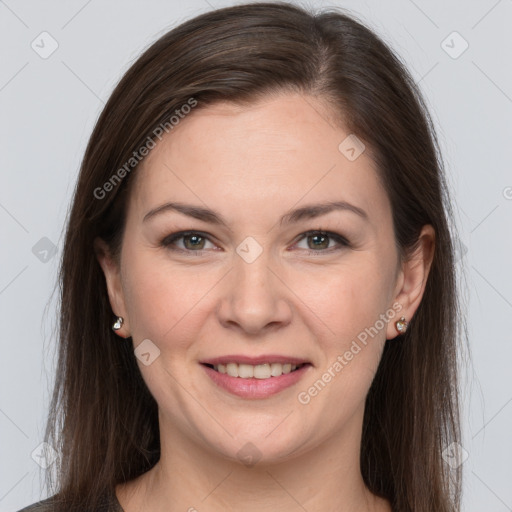 Joyful white young-adult female with long  brown hair and grey eyes