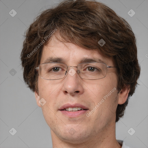 Joyful white adult male with short  brown hair and grey eyes