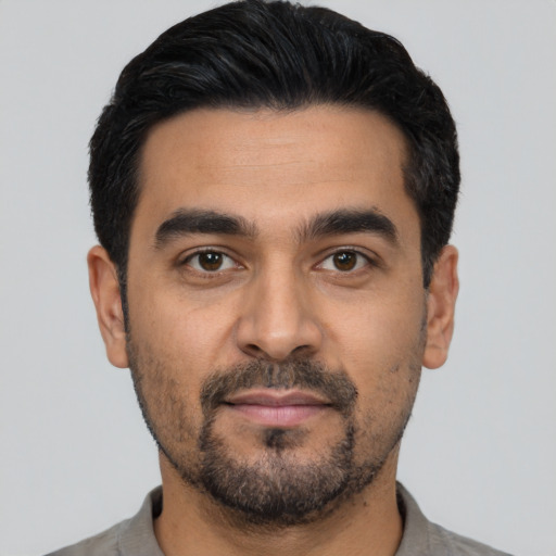 Neutral latino young-adult male with short  black hair and brown eyes
