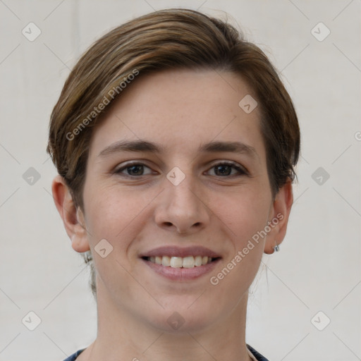 Joyful white young-adult female with short  brown hair and grey eyes