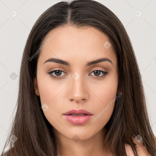 Neutral white young-adult female with long  brown hair and brown eyes