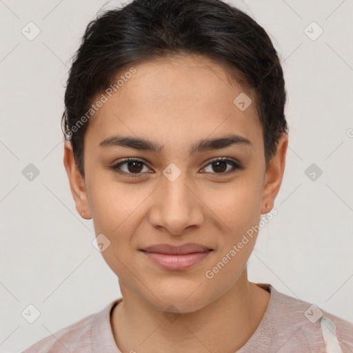 Joyful latino young-adult female with short  brown hair and brown eyes