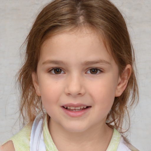 Joyful white child female with medium  brown hair and brown eyes