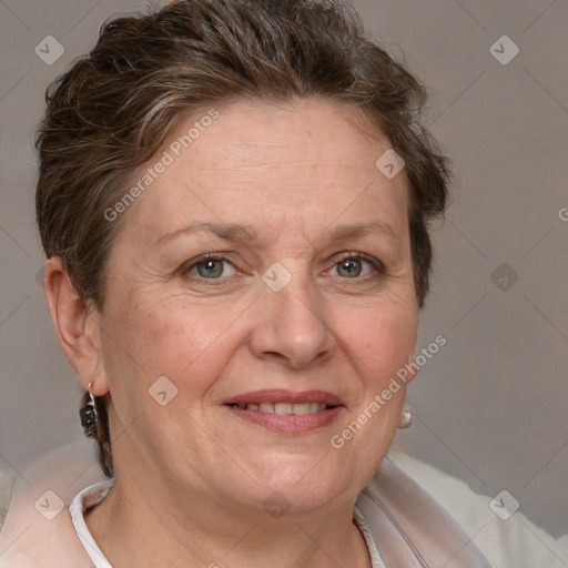 Joyful white adult female with short  brown hair and brown eyes