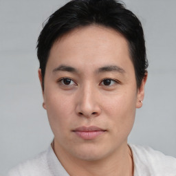 Neutral asian young-adult male with short  brown hair and brown eyes