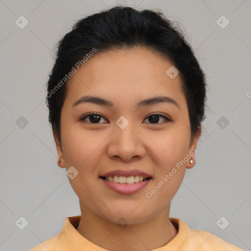 Joyful asian young-adult female with short  brown hair and brown eyes