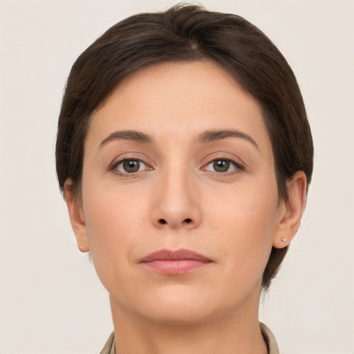 Neutral white young-adult female with short  brown hair and brown eyes