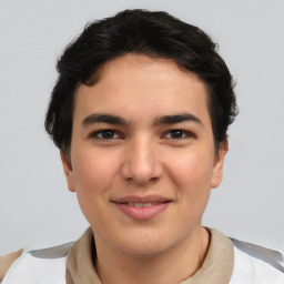 Joyful asian young-adult male with short  brown hair and brown eyes