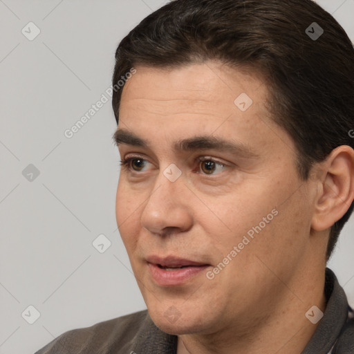 Joyful white adult male with short  brown hair and brown eyes