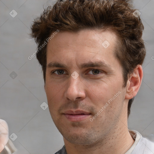 Neutral white young-adult male with short  brown hair and brown eyes