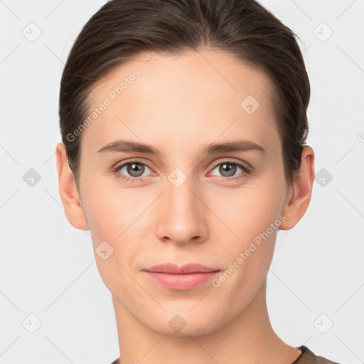 Neutral white young-adult female with short  brown hair and brown eyes