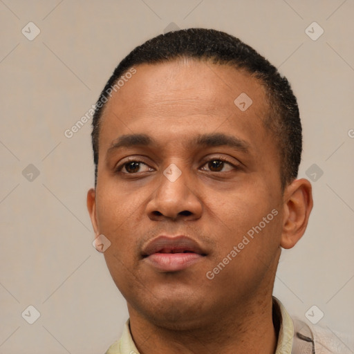 Neutral latino young-adult male with short  black hair and brown eyes