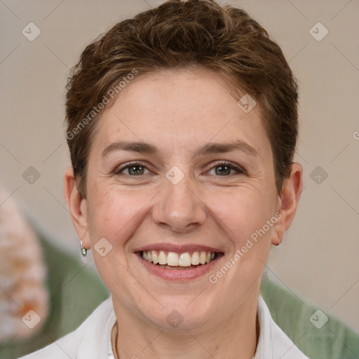 Joyful white adult female with short  brown hair and brown eyes