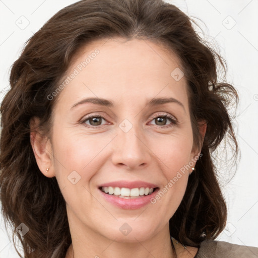 Joyful white young-adult female with medium  brown hair and green eyes