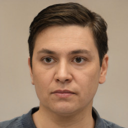 Neutral white adult male with short  brown hair and brown eyes