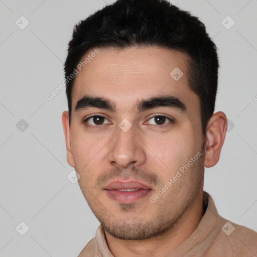 Neutral white young-adult male with short  black hair and brown eyes