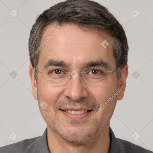 Joyful white adult male with short  brown hair and brown eyes