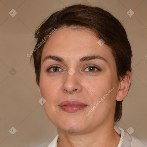 Joyful white adult female with medium  brown hair and brown eyes