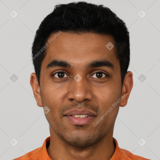 Joyful latino young-adult male with short  black hair and brown eyes