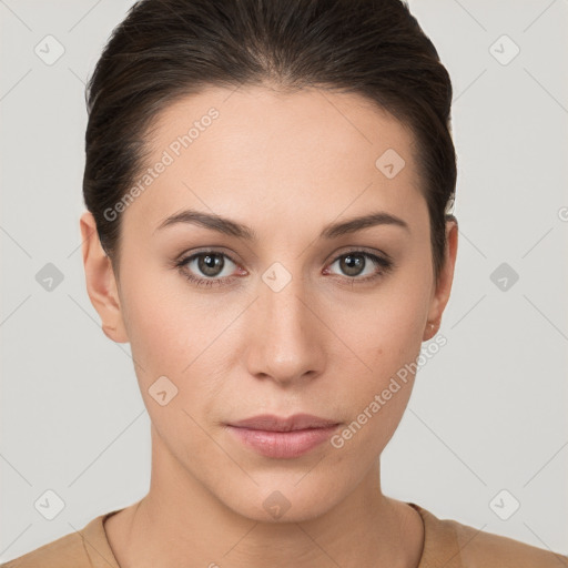 Neutral white young-adult female with short  brown hair and brown eyes