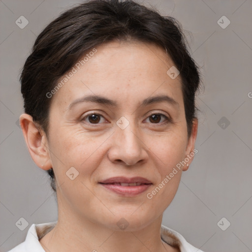 Joyful white adult female with short  brown hair and brown eyes