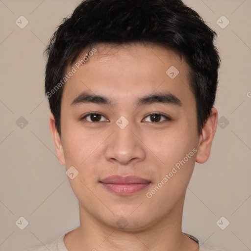 Joyful asian young-adult male with short  black hair and brown eyes