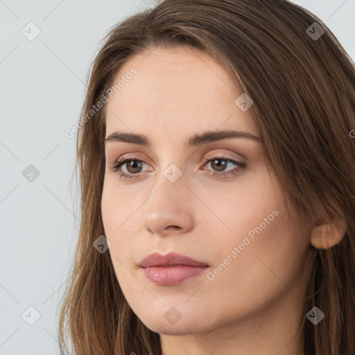 Neutral white young-adult female with long  brown hair and brown eyes