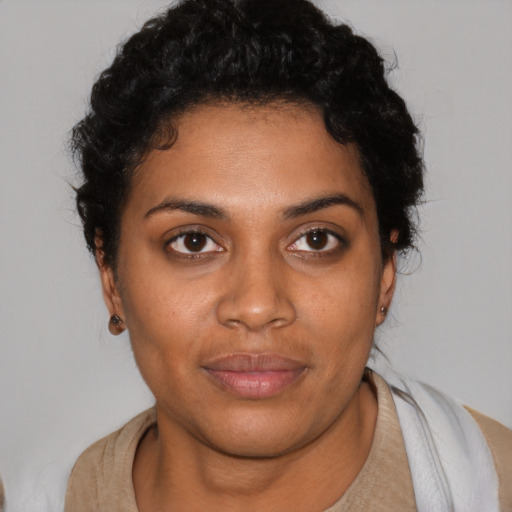 Neutral black young-adult female with short  brown hair and brown eyes