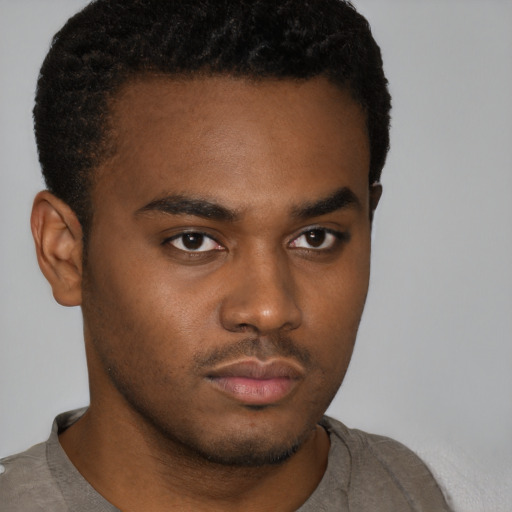 Neutral black young-adult male with short  brown hair and brown eyes